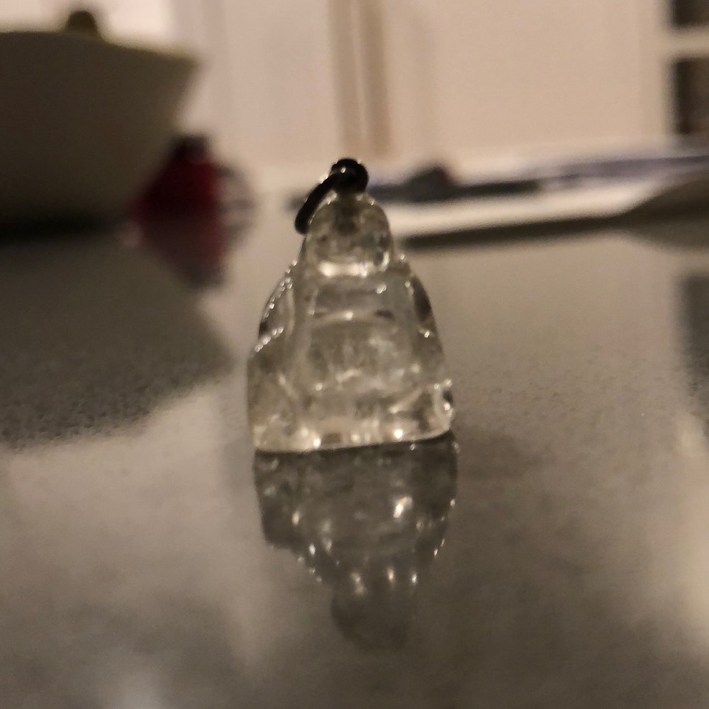 Designer Faye Kim’s Buddha crystal charm